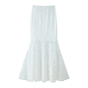White lace high waist mermaid skirt detail showing exquisite floral texture and flare hem.