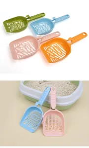 Cute cat litter scoop with hollow face design, durable plastic pet cleaning tool, multicolor