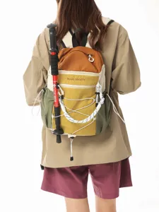 Color-block casual daypack with trekking pole holder, stylish multi-pocket travel backpack.