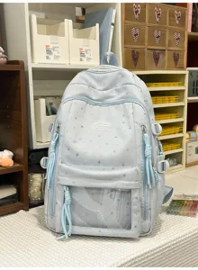 Detailansicht des hellblauen japanischen Sternchen Schulrucksacks mit praktischer transparenter Vordertasche.
