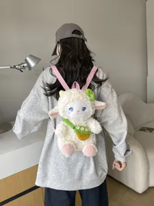 Cute cartoon sheep plush backpack, fluffy lamb doll double shoulder bag with pink straps.