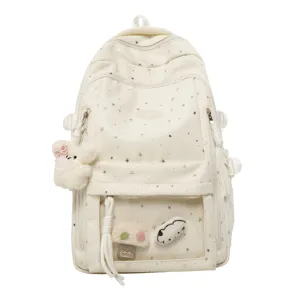 Japanischer weißer Rucksack mit Sternenmustern, transparenter Vordertasche und Plüschanhängern.