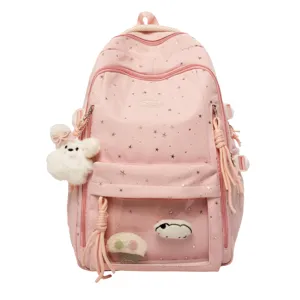 Rosa Sternenmuster süßer Schulrucksack mit transparenter Fronttasche und Plüschtier Anhänger.