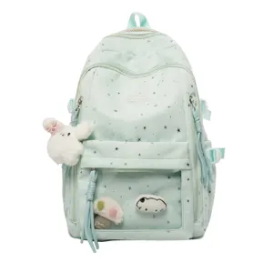 Mintgrüner Rucksack mit Sternenmuster, Sichtfenster und Plüsch-Hasenanhänger für Schüler.