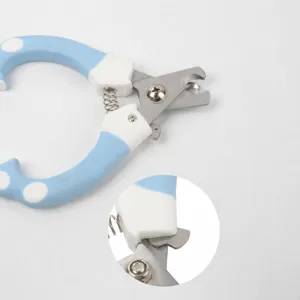 Pet nail clipper with safety lock and non-slip polka dot handle for dog and cat grooming.