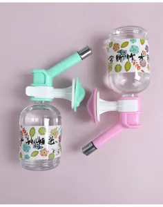 Hanging pet water dispenser with automatic food grade nozzle for dogs and cats, easy installation.