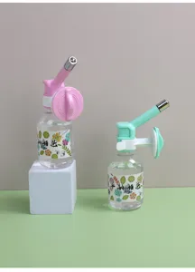 Hanging pet water dispenser bottle for dogs and cats, cage mounted automatic waterer feeder.