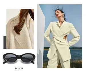Modische retro ovale Sonnenbrille für Damen, schwarzer Sonnenbrillen-Rahmen mit tollen Outfit-Details.