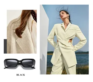 Trendy small frame sunglasses for women, stylish black eyewear for street snap and daily fashion look.