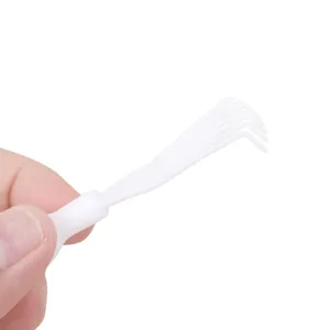 White plastic comb cleaning tool, hair brush cleaner claw for daily use, practical design.