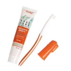 Pet dental care kit with toothpaste, long toothbrush and finger brush for dogs and cats.
