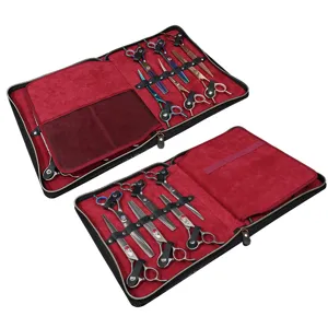 Set professionale di forbici per toelettatura animali con pratica custodia in pelle nera.