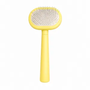 Cepillo de aguja amarillo para gatos peine de aseo para mascotas diseño limpio y práctico