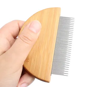 Pet flea comb with wooden handle and stainless steel fine teeth for cats and dogs grooming.