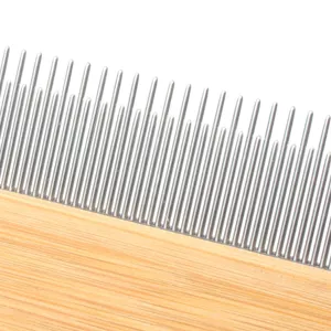 Wooden handle pet flea comb with fine metal teeth for cats and dogs grooming care.