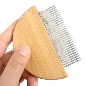 Wooden pet flea comb with stainless steel teeth for cat and dog grooming and hair removal.