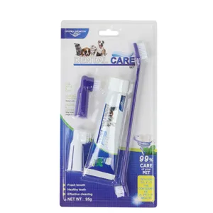 Pet dental care set with toothpaste, dual toothbrush and finger brushes for dogs and cats.