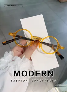 Minimalistische modische runde Blaulichtfilter Brille mit gelben und Schildpatt-Buegeln.