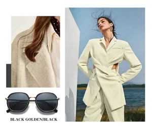 Modische Damen Sonnenbrille mit schwarzem goldenen Rahmen, lässiger koreanischer UV Schutz.