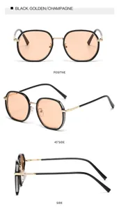 Detailansicht einer modischen Damensonnenbrille mit schwarz goldenem Rahmen und champagner Gläsern.