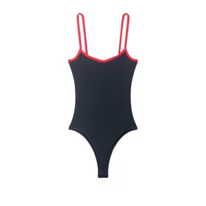 Close-up of black ribbed fabric and red contrast trim detail on the stylish women bodysuit.