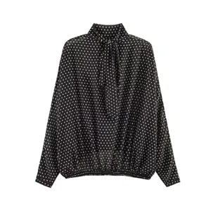 Black polka dot long sleeve blouse with high neck and bow tie detail, elegant apparel.