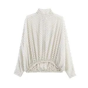 Elegant women's polka dot long sleeve high collar blouse with gathered hem detail.