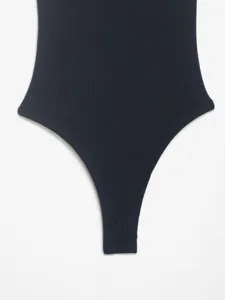 Black ribbed knit bodysuit detail view, comfortable stretch fabric high cut design.
