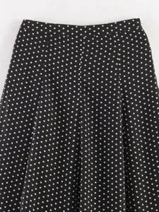 Black and white polka dot midi skirt detail close up fabric texture elegant daily wear