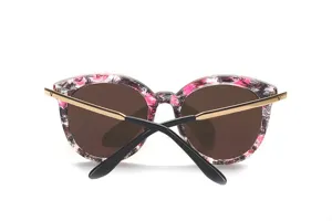 Stilvolle Damen Sonnenbrille mit rosa Blumenmuster und goldenen Metallbügeln für Alltag.