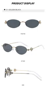 Gafas de sol ovaladas sin montura elegantes con detalles de diamantes de imitación doradas