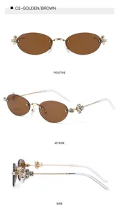 Gafas de sol ovaladas sin montura con lentes marrones montura de metal dorado y pedrería brillante.