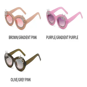 Modische ovale Sonnenbrille mit Strass-Schleifen und Farbverlaufsgläsern für stilvollen Alltag.