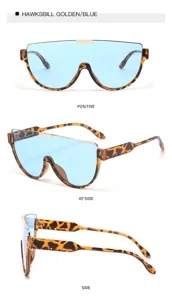 Occhiali da sole a mascherina tartarugati alla moda con lenti blu e dettaglio ponte oro.