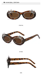 Detailansicht der braunen Schildpatt-Sonnenbrille mit Strass-Schleife und funkelndem Rand.