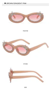 Modische rosa ovale Sonnenbrille mit funkelnden Strass-Schleifen und Farbverlaufgläsern.