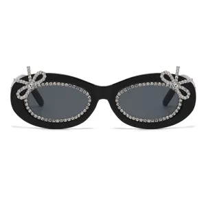 Schwarze ovale Sonnenbrille mit Strasssteinen und Kristallschleife fur Damen Streetstyle