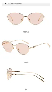 Gafas de sol cat-eye de metal vista detallada, lentes rosas elegantes para exteriores.