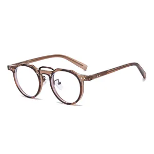 Stylish retro round optical glasses with translucent brown frame and metal bridge details.