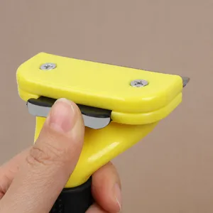 Professional pet deshedding comb with one-button hair removal and ergonomic TPR grip design.