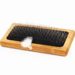 Bamboo pet slicker brush for cats and dogs, fine metal pins for effective grooming and hair removal.