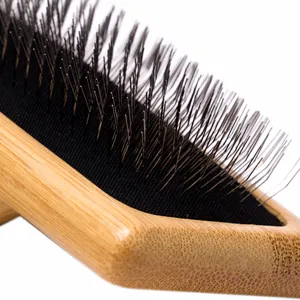 Bamboo pet slicker brush for dogs and cats with fine metal pins for grooming and deshedding.