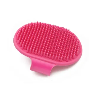 Brosse de bain rose en silicone pour animaux avec picots de massage et sangle pour chats.