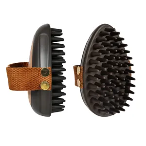 Handheld pet bath brush with soft silicone bristles, comfortable strap for grooming dogs and cats.