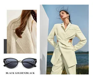 Stylish black golden cat-eye sunglasses with fashionable outdoor apparel matching.