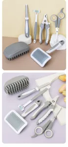 Set de aseo profesional para mascotas con cepillo carda, cortaúñas y tijeras para perros y gatos.