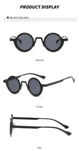 Detailansicht zeigt mehrwinkelige schwarze runde Vintage-Sonnenbrille mit feinem Seitenprofil.