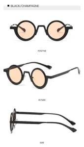 Klassische Retro-Sonnenbrille mit rundem Rahmen, schwarzem Gestell und champagnerfarbenen Gläsern.