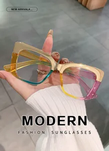 Close-up detail of stylish plastic cat-eye anti-blue light glasses with vibrant gradient frames.
