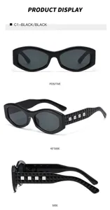 Schwarze ovale Sonnenbrille mit modischem Design und nietenbesetzten Bügeln Detail